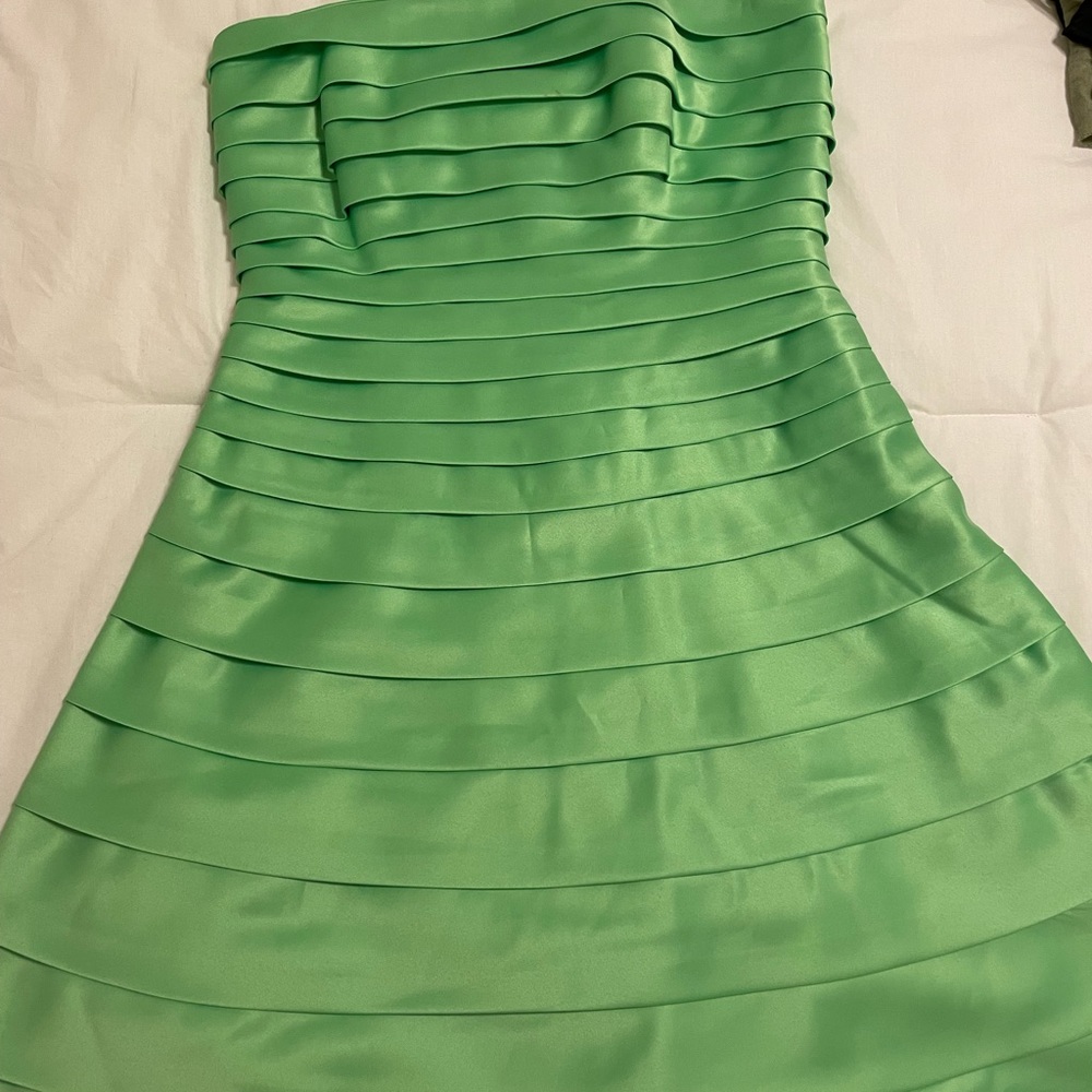 Lime green shuttered satin party dress
